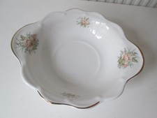 Trent-Mill Staffordshire fruit bowl. White with floral design and gold trim.