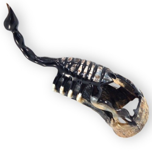 Hand carved horn - hand,