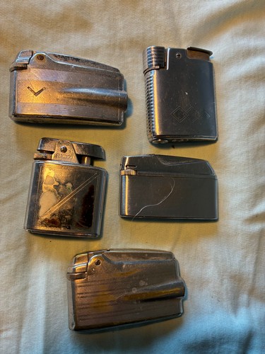 Old used cigarette lighters - 5,