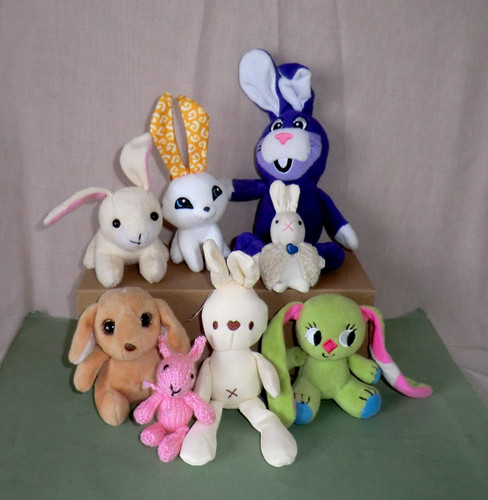 Eight soft toy rabbits - eight,