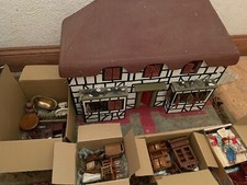 Antique Tudor dolls house and  furniture