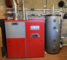 15kw Biotech Toplight M Biomass Boiler with buffer cylinder wood pellet boiler.
