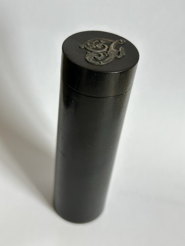 Old cylindrical dark wooden - old,