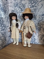 Pair Of Porcelain Dolls In