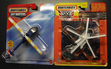 MATCHBOX SKYBUSTERS AIR BLADE & ROBINSON R66 TURBINE HELICOPTERS MINT ON CARDS