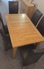 DFS solid oak dining table, 8 chairs and matching sideboard 