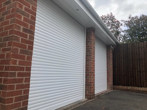 Electric roller garage doors