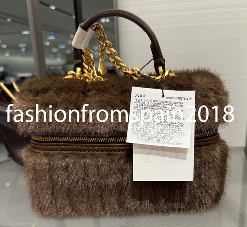 Zara new woman faux - fur, rigid