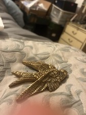 Gold Coloured Swallow Bird