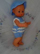 CUTE BABY DOLL. DRESSED IN