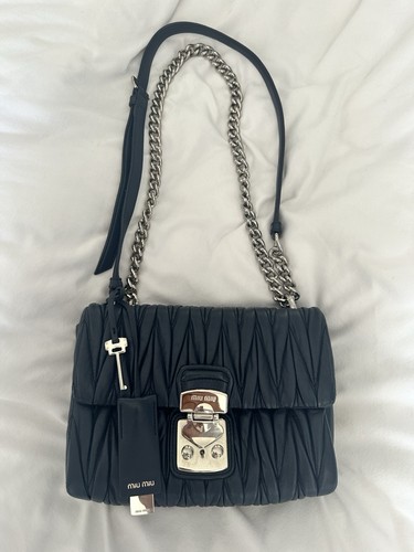 Authentic miu - miu,