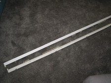 two 2.7m (9ft )white  swish curtain rails. with fixings and bag of new  hooks