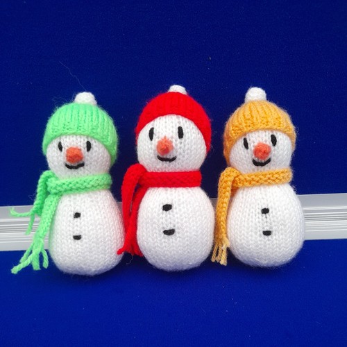 Three hand knitted - , snowman