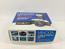 MINOLTA X-300 CAMERA OUTFIT with camera, lenses & accessories