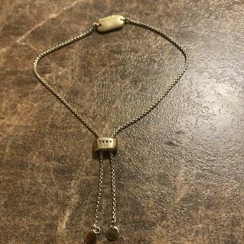 Dkny gold tone slider - gold,