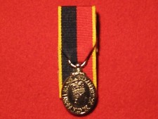 MINIATURE COURT MOUNTED VRSM MEDAL WITH HAC RIBBON WORN