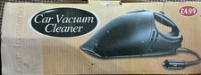 car vacuum cleaner.  plug in, new but has been stored in garage , box damaged
