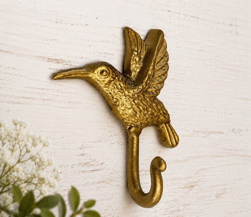 Gold cast iron hummingbird - cast,