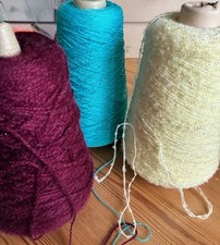 Knitting machine fancy yarn,  part used, mixed colour cones x3