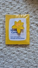 Marie Curie pin badge Daffodil