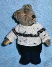 Hand knitted teddy bear