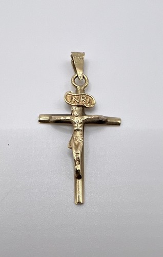 10k solid gold crucifix 91g - 10k, 0.91g.