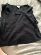 Black Belly Top for A 9 Year Old Girl Never Worn In Great Condition