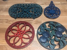 4 Cast Iron Trivets ,Nice