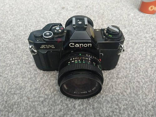 Canon 135 slr camera - av,