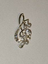 A Musical Treble Clef Brooch