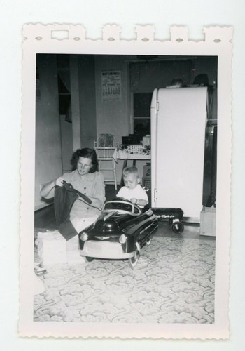 Boy with large toy peddle - , car