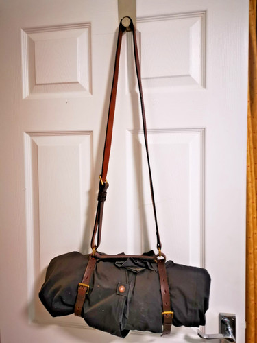 Leather strap coat carrier - leather,
