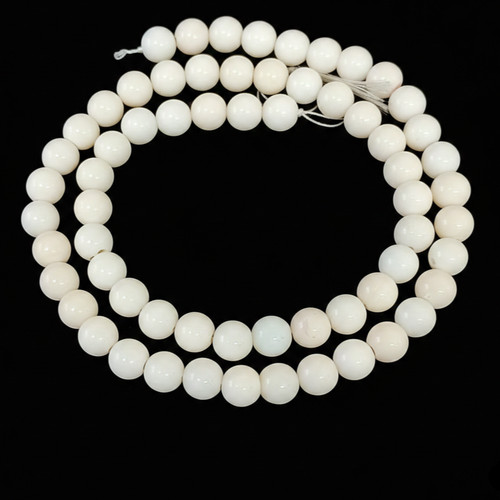 Natural round dark red coral - natural,