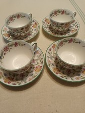 FOUR BONE CHINA MINTON HADDON HALL CUPS AND SAUCERS