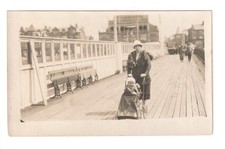 Southport Pier - woman pushing baby in pushchair - old real photo postcard