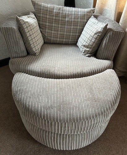 Swivel chair with footstool