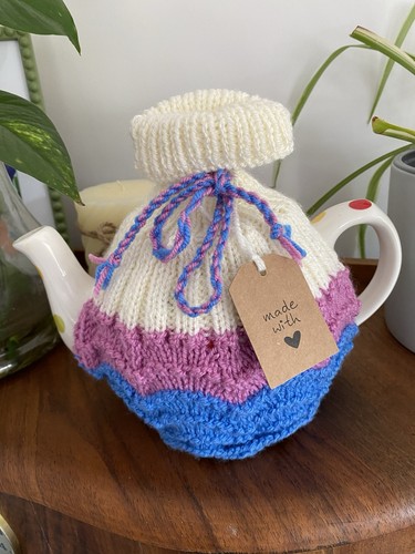 Hand knitted tea - hand,