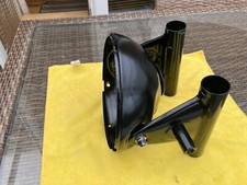 Suzuki GT185  headlight bucket and ears