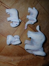 4 miniature elephants