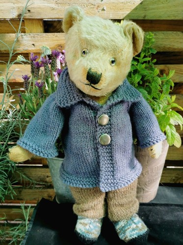 Hand knitted teddy bear
