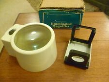 Vintage illuminated magnifier plus one