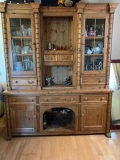 Large solid pine display cabinet in good condition. 2 piece. Buyer to collect. 