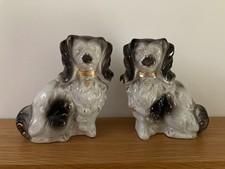 Vintage pair Staffordshire / Wally / spaniel mantle dogs 19cms tall black white
