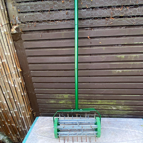 Manual spike lawn - manual,