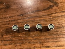 Land Rover branded tyre valve caps. Metal. Unused. Excellent quality.
