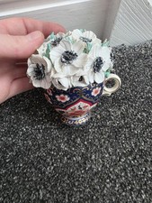 miniature porcelain teapot decorated in the Imari style
