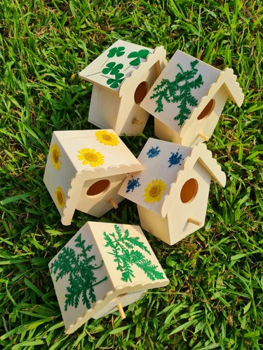 Wooden bird house with dried - house,