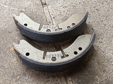 TRIUMPH T120,TR6,T140 ETC NEW OLD STOCK CONICAL HUB FRONT BRAKE SHOES (LOT 30)