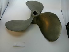 Antique brass boat motor