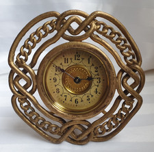 VINTAGE ORNATE BRASS WIND UP DRESSING TABLE OR MANTEL CLOCK